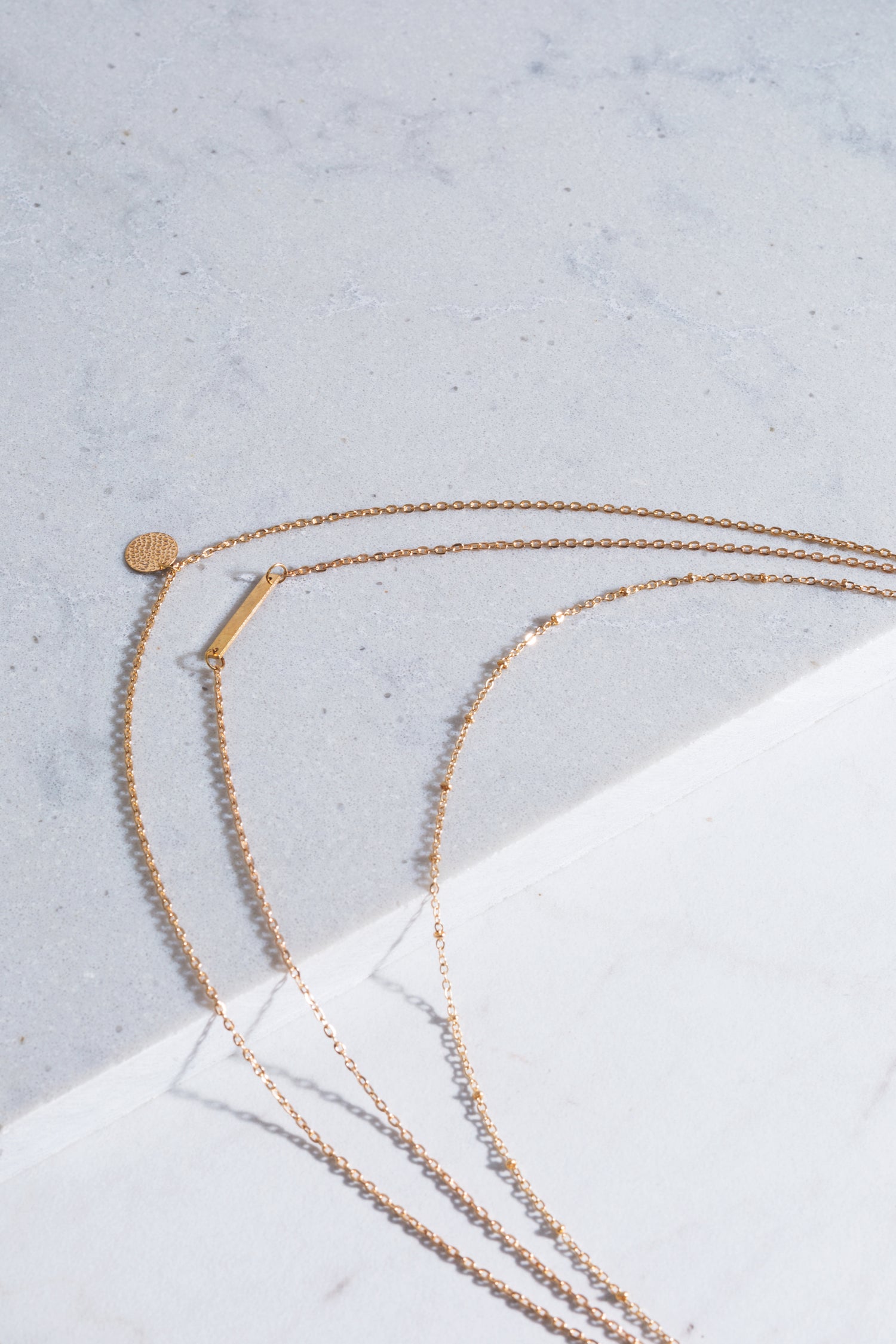 Gold and Diamond Stacking Necklaces in Beverly Hills, CA