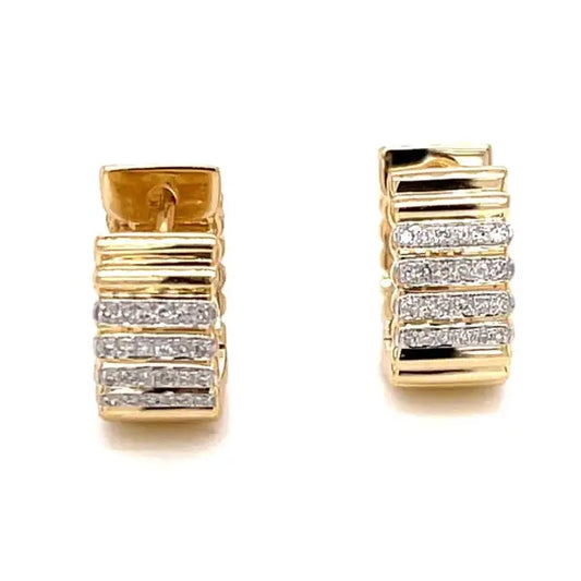 Layer huggie with diamond earrings