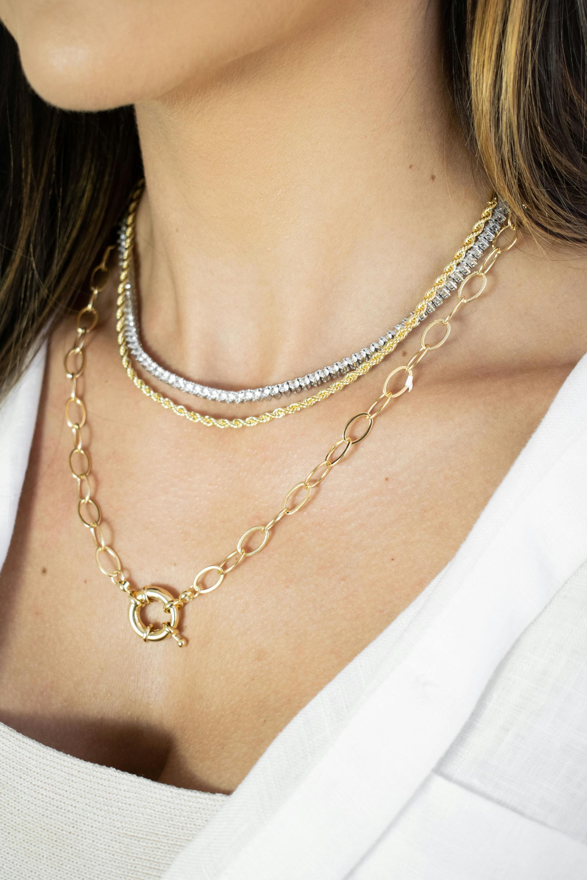 Gold and Diamond Stacking Necklaces in Beverly Hills, CA