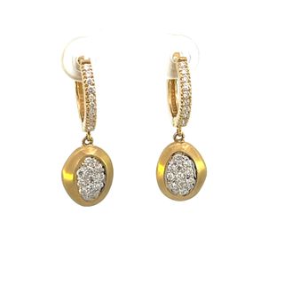 Gold hanging earrings with diamond pave center