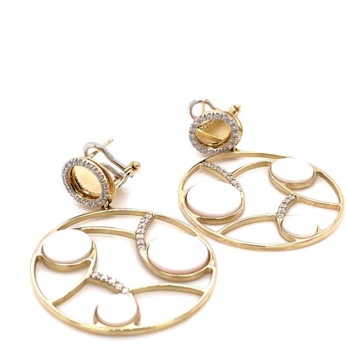 Medium-sized hoop earrings with round opal-esque circles in the center with a gold stud at the top.