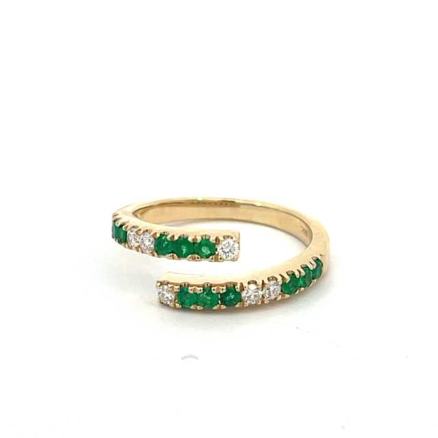 Round brilliant green emerald ring