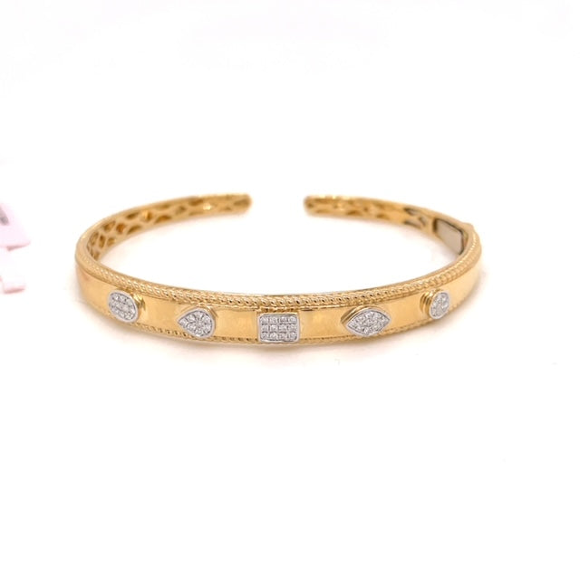 A gold bangle with open end
